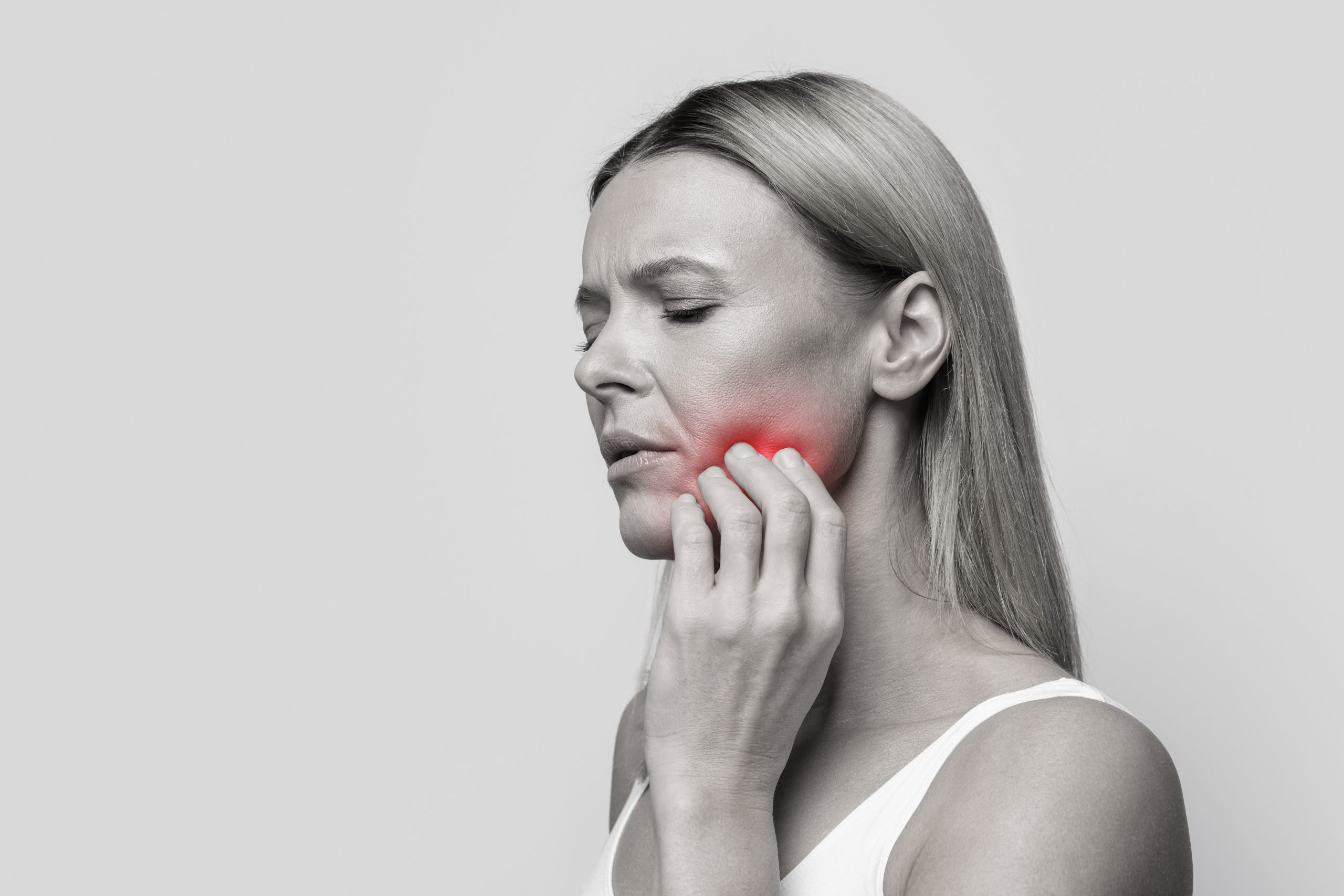 woman with jaw koint pain